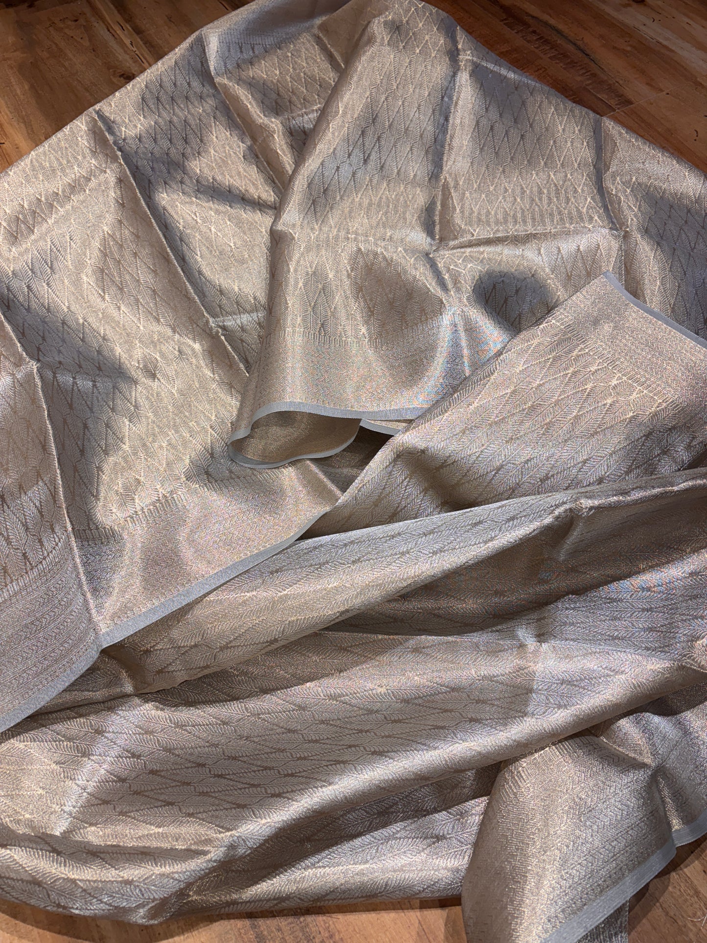 SILVER BANARASI TISSUE SAREE – LUXURIOUS SHEER ELEGANCE